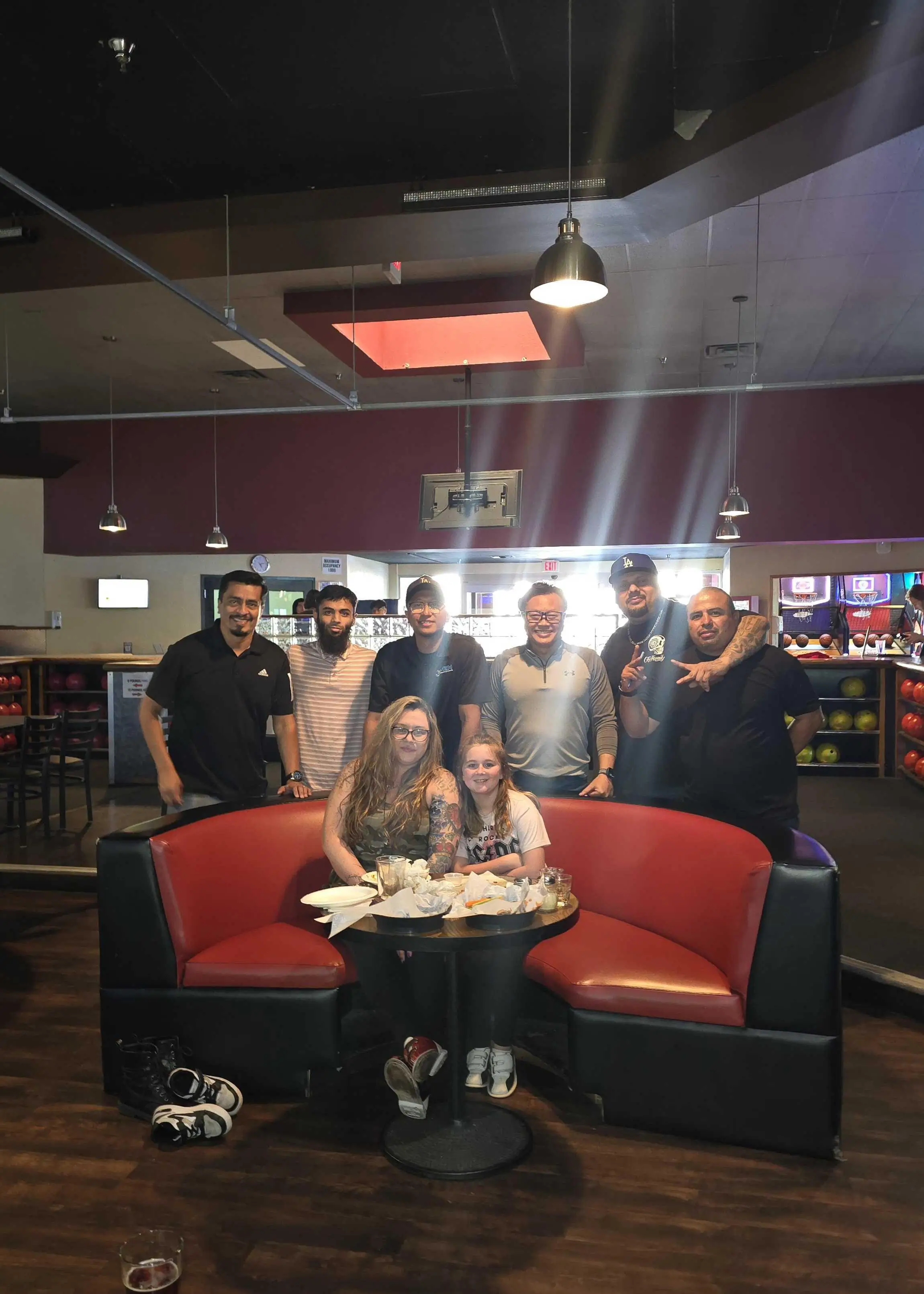 Pen Manufacturing team members working together in modern metal fabrication facility